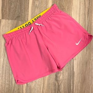 Nike Women’s 2-in-1 Pink Athletic Shorts with Purple-Gray Compression Liner
